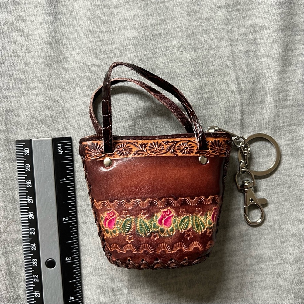 Vintage brown leather coin purse keichain with engraved flowers